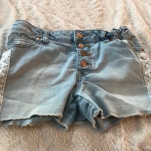 Slightly frayed jean shorts